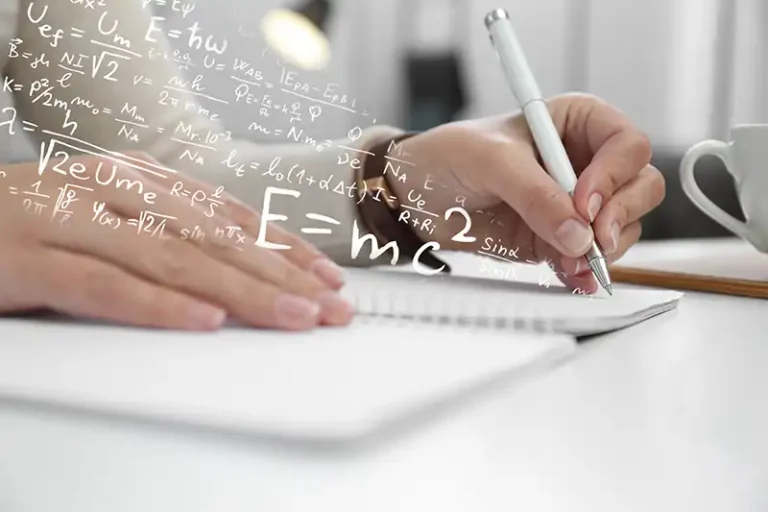 Person writing in a notebook with physics formulas and E=mc^2 overlaid in the scene.